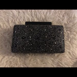 Hardcase strass clutch with detachable chain.